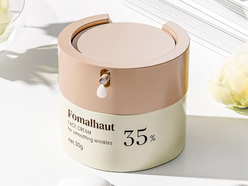 Wide-mouth cosmetic jar with a press-top disc dispensing cream from the center hole without air contact