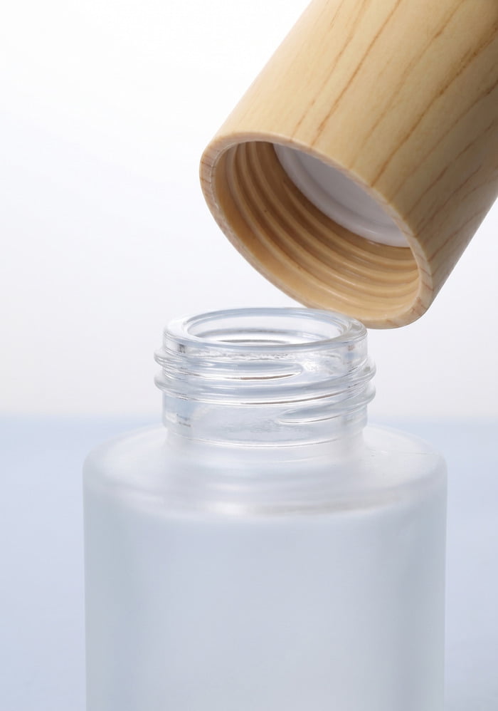 Close-up of cosmetic bottle thread precision