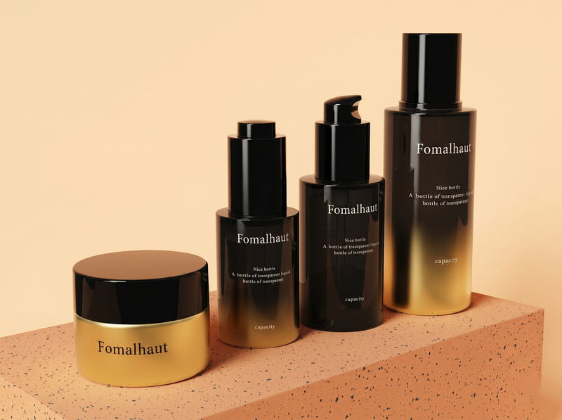 Standard glass and plastic cosmetic bottles with cohesive brand decoration