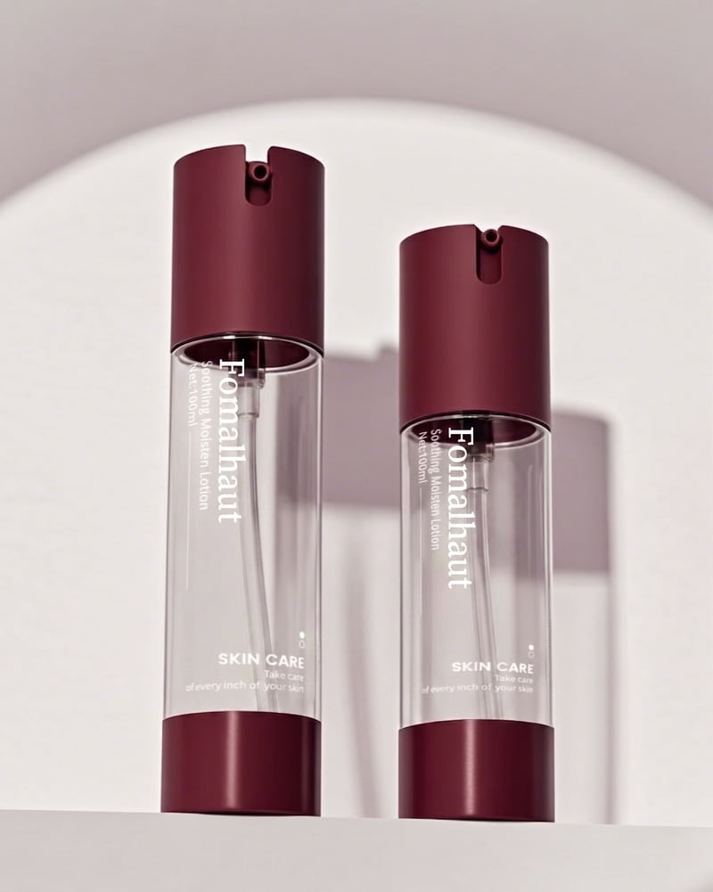Crystal clear AS cosmetic packaging material including airless bottles, transparent lip gloss tubes, and compact powder cases manufactured by Fomalhaut