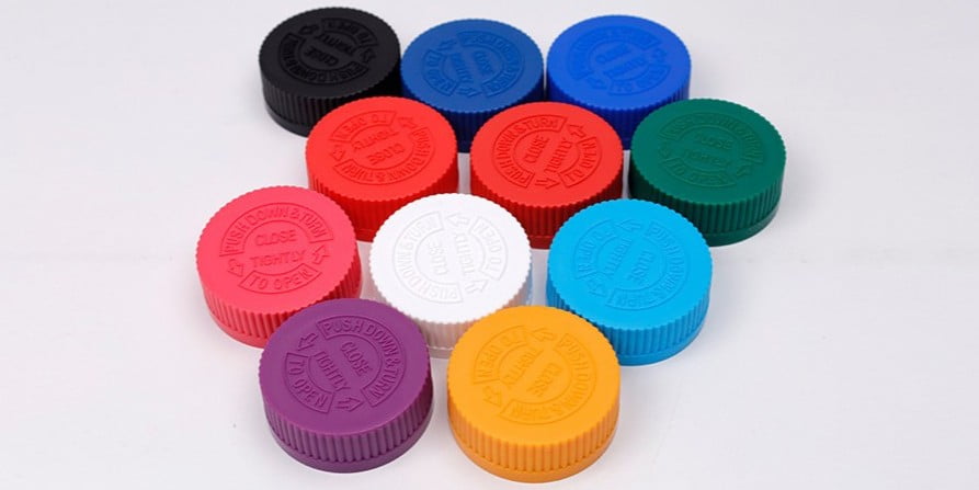 Custom color cosmetic caps and Pantone matched closures