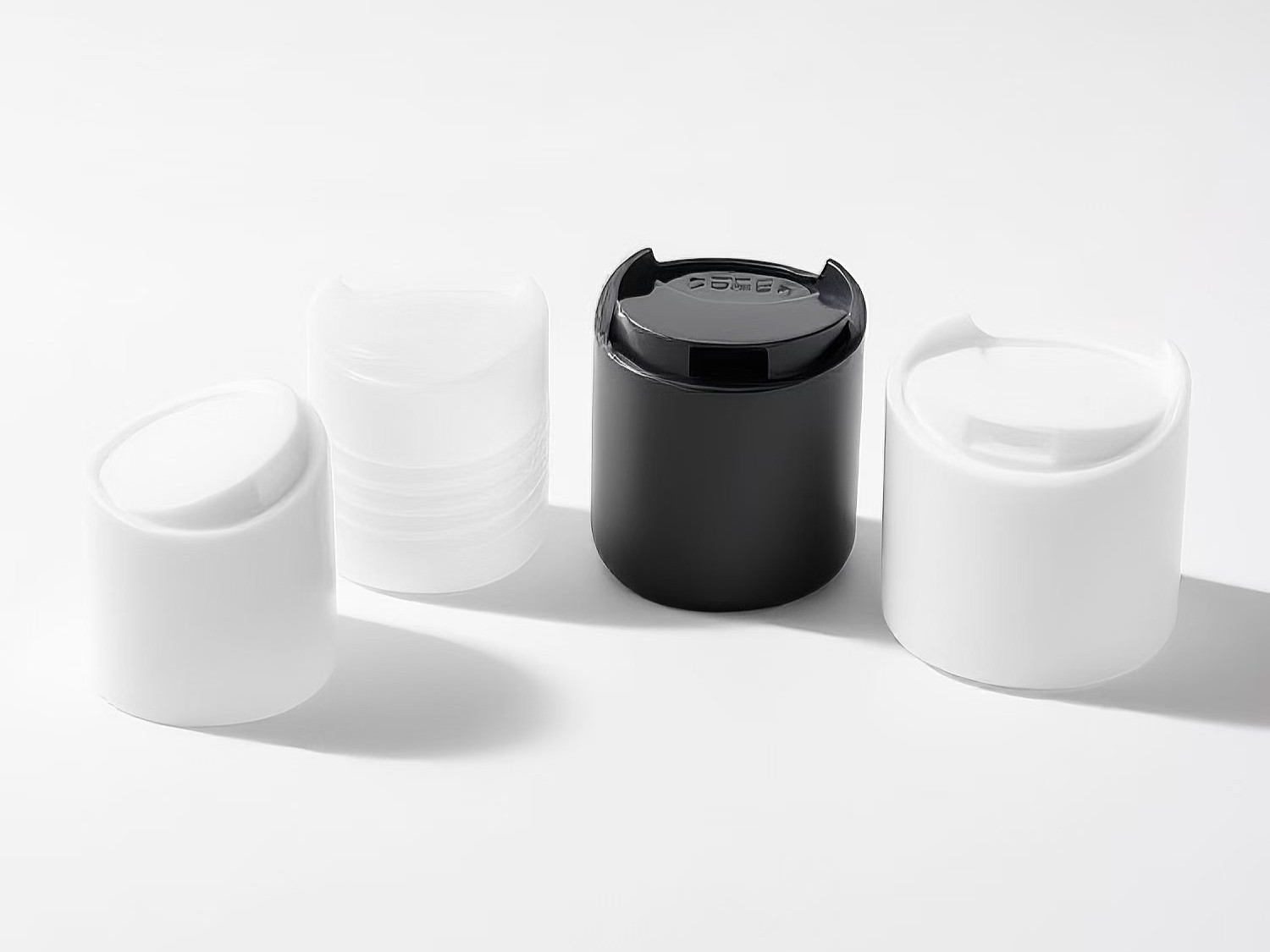 Disc Top Caps for Cosmetic Bottles