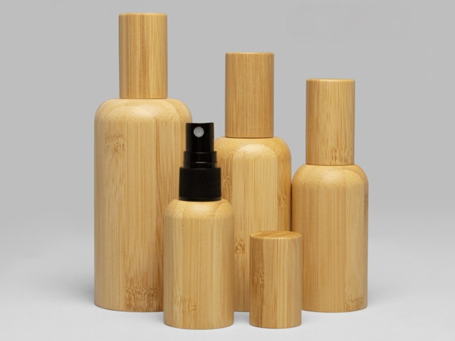 Eco-compliant bamboo cosmetic packaging featuring PCR bottles and all-plastic PP pumps