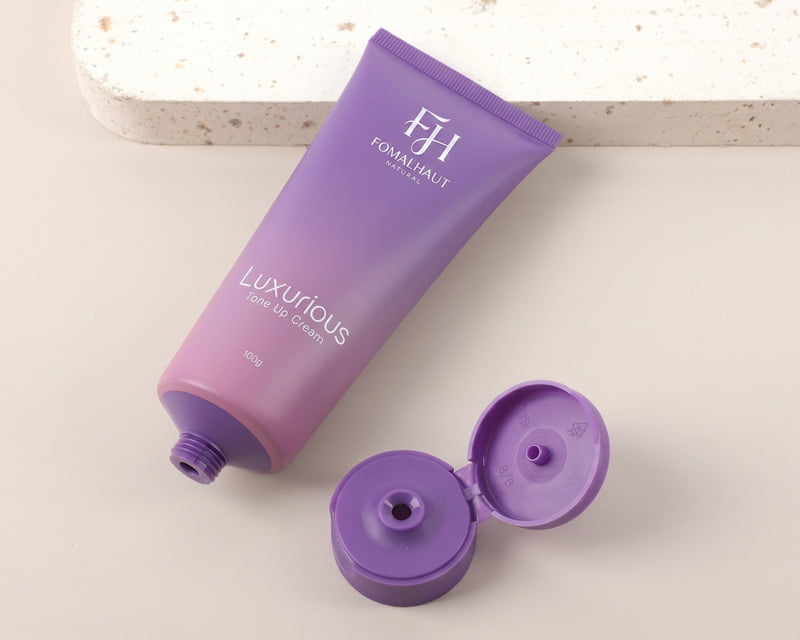 Flip-top cosmetic tubes and screw cap squeeze tubes
