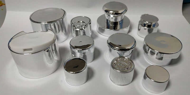 Metallized plastic caps and electroplated cosmetic closures