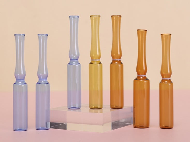 Snap-off glass cosmetic ampoules with color break rings for single-dose intensive serums