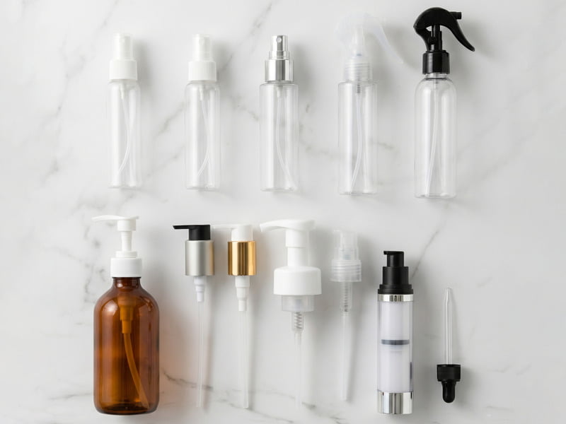 Various cosmetic pump actuator styles and aluminum over-shell pumps