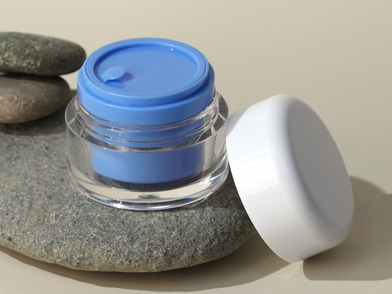 Exquisite double-wall cosmetic jar with a transparent outer acrylic shell and a suspended colorful PP inner container