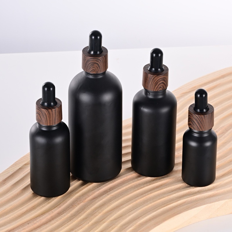 Minimalist frosted glass cosmetic dropper bottle